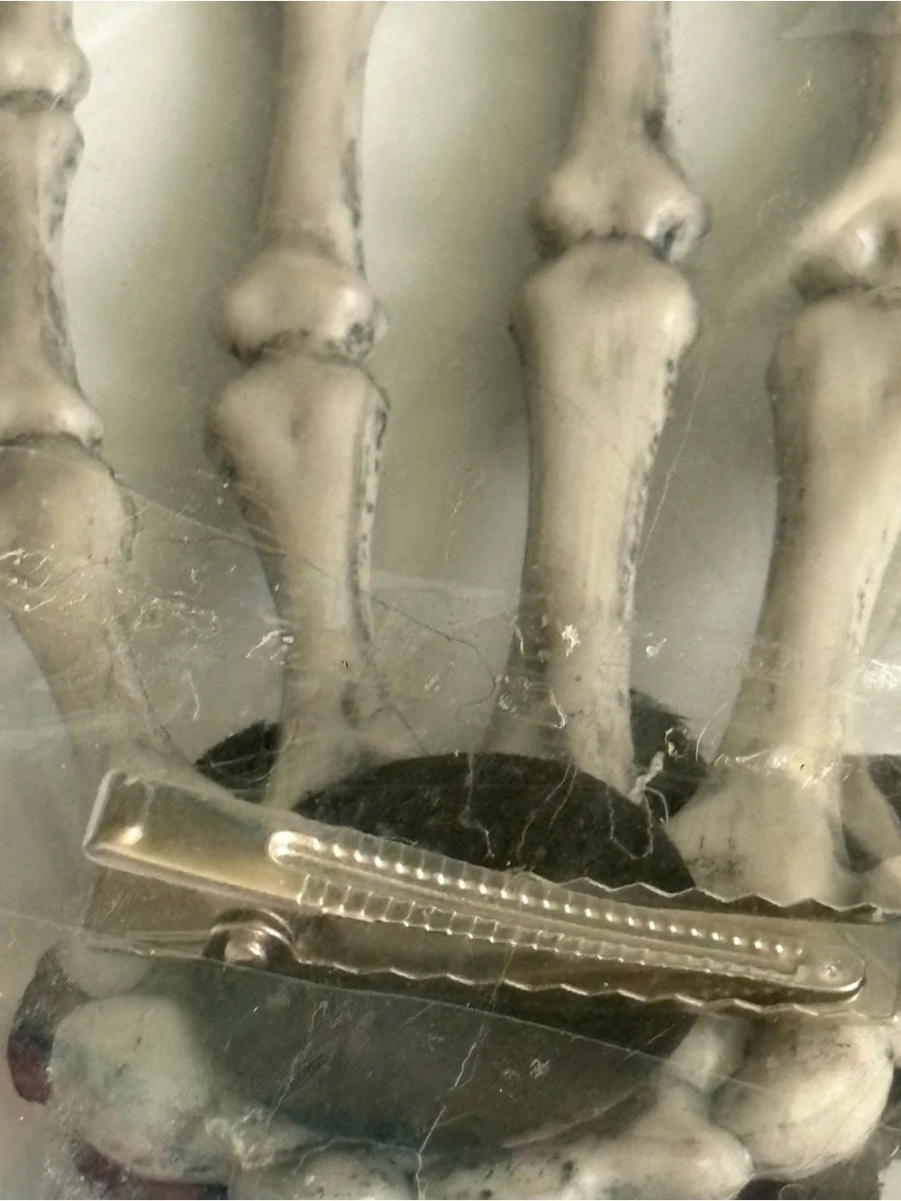 Gothic-style skeleton hand hair clip